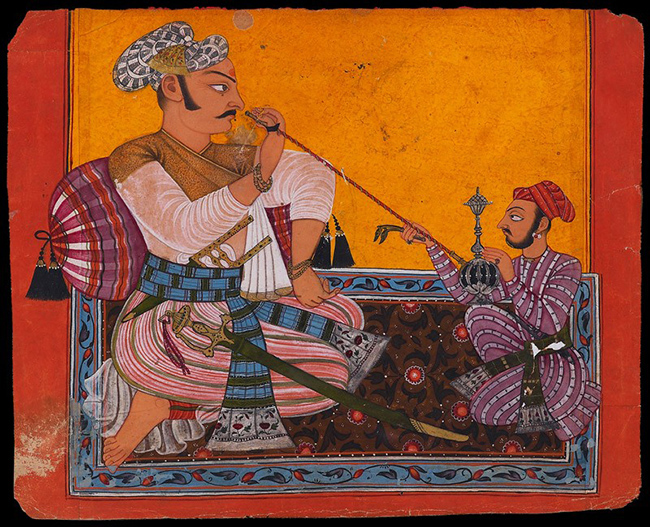 Maharaja Bhupat Pal smoking a hookah