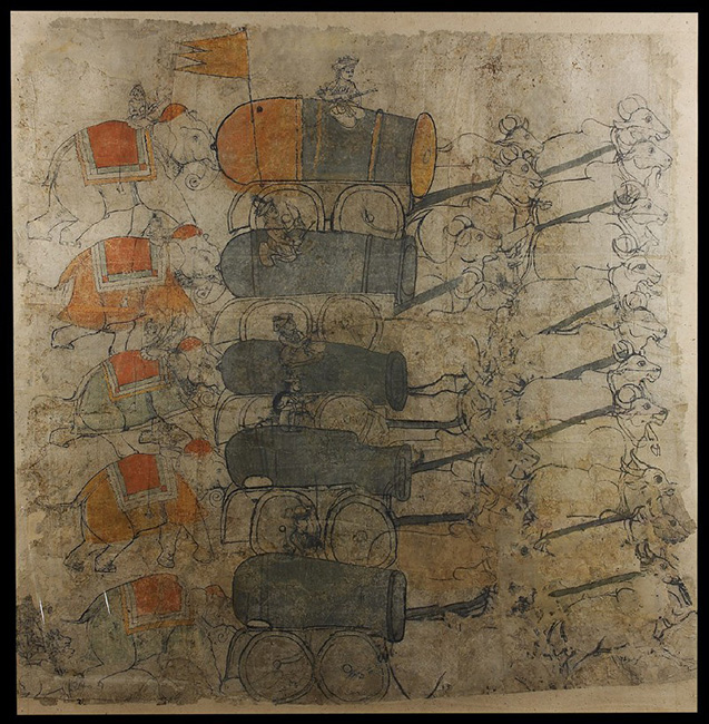 Elephants pushing cannons drawn by bullocks