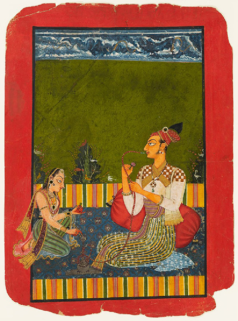 Maharaja Medini Pal smoking a hookah